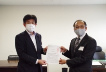 左：安齋商工労働部長　右：久保木事務局長